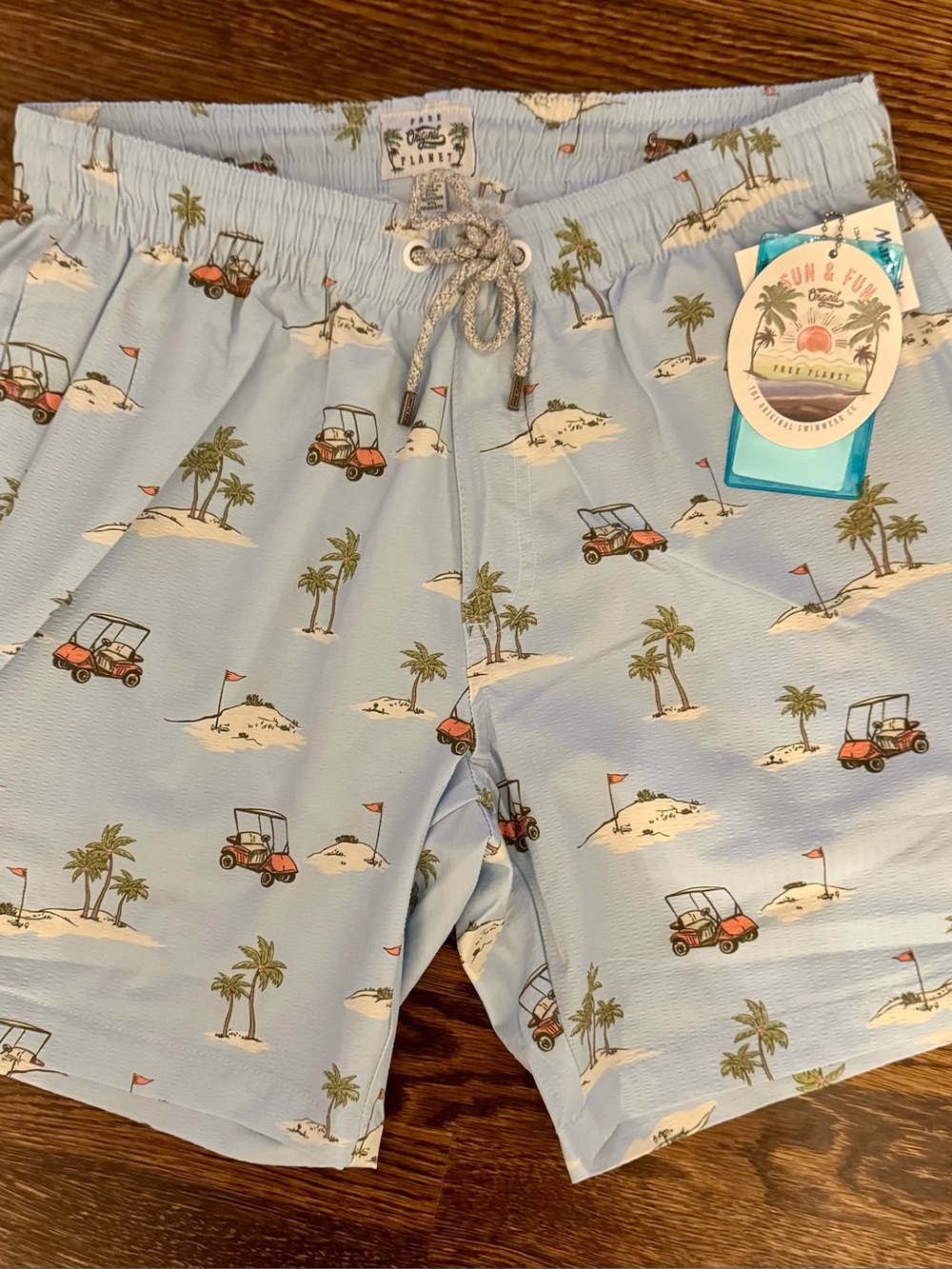 Free Planet Men’s Light Blue Golf Cart & Palm Print Swim Trunks- Medium